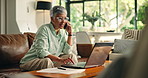 Mature woman, laptop or phone call with document for blog FAQ, story questions or online interview. Remote work, home or journalist with contact for source verification, article lead or writing info