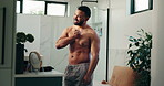 Smile, man and flexing biceps in bathroom of fitness goals, muscle growth and workout results. Male person, mirror and inspection of body transformation, strong progress and grooming routine at house