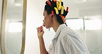 Home, toothbrush or woman with brushing teeth in mirror for oral hygiene, fresh breath or gingivitis. Morning routine, person and cleaning mouth in bathroom for plaque removal, getting ready or habit