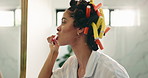 Woman, toothbrush or brushing teeth in mirror of bathroom for dental care, fresh breath or hygiene. Morning routine, person and cleaning mouth in home for plaque removal, gum health and getting ready