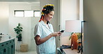 Woman, hairstyling and dance with phone in bathroom for morning, makeover or routine in home. Smile, texting and excited with foam hair curling rods in apartment for haircare, getting ready and date