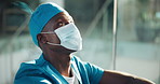 Black man, doctor or stress with face mask for mistake, disappointment or fail procedure at hospital. Male person, nurse or upset surgeon with regret for loss, grief or bad health operation at clinic