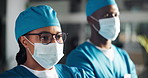 Face mask, surgeon and nurse confident in hospital for healthcare, wellness and safety. Woman, man and medical professional group with ppe, scrubs and surgery employee for support, help and clinic
