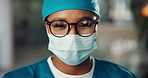 Woman, doctor and face with mask for surgery, healthcare safety or protection at hospital. Portrait, female person or nurse with glasses or visor in medical uniform for surgical procedure at clinic