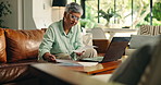 Documents, research and laptop with old woman on sofa for retirement savings, loan application and audit. Insurance report, balance sheets and annuity fund with person in living room of home