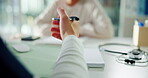 Hand, nurse and talking to patient in clinic for healthcare, checkup and advice. Medical professional, consultation and person with pen in appointment for help, diagnosis and explain treatment plan