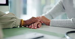 Doctor, patient and comfort by holding hands for bad news, diagnosis results and treatment advice. Medical worker, support and consoling person for terminal illness, recovery and healthcare services