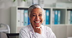Face, mature woman and doctor in office for career pride, about us and healthcare services. Portrait, female person and laugh for funny joke, medical advice and positive attitude for treatment trust