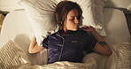 Sleeping, above and woman on bed with stretching, calm and dreaming in bedroom with pillow in apartment. Nap, relax and cozy rest on mattress with tired, morning peace and weekend break in house