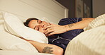 Thinking, yawning and wake up with woman in bedroom for reflection, memory and morning routine. Relax, resting and wellness with person lying in bed of home for energy, comfortable and inspiration