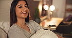 Home, face and woman with smile in bedroom and laughing at night with pyjamas, relax or comfortable. Happy, Indian person and break on weekend in house, rest and warm with blanket on bed in apartment