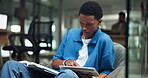 Creative, man and tablet with book in office for article research, compare sources or story info. Media agency, content writer or digital app for proofreading, submission review or workflow in lounge