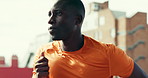 Fitness, running and black man in city for workout, marathon training and exercise outdoor. Sports, runner and person for wellness, performance and endurance for race, sprint and challenge in town