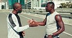 Man, runner and coach with fist bump in city for advice, support or guide with stopwatch on bridge. Black people, athlete and mentor for stats, handshake or talk with motivation for training in Kenya