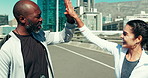 Woman, runner and coach with high five in city for advice, support or guide with celebration in road. People, athlete and mentor with stats, clapping hands and motivation for training on bridge