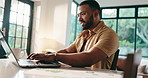 Documents, laptop and solution with freelance man in home office for budget or financial report. Computer, problem solving and thinking with remote work person in apartment for finance or investment
