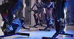Fast, cycling and legs with bike, gym and performance for group with machine, wellness and training. Cardio, ride and people with equipment for fitness, healthy and energy for workout or exercise