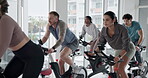 People, instructor and bicycle for spin class at gym for fitness, cardio training and endurance. Coach, applause and woman on cycling machine, workout success and celebration of performance goals