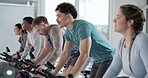 Bike, fitness and group of people in spin class together for cardiovascular challenge or training. Cycling, exercise and stationary spinning with friends in gym for performance or workout routine