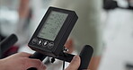 Monitor, cycling and fitness with hands in gym for training, elliptical machine stats and cardio. Wellness, speed tracking and exercise with people on stationary bike in sports center for spin class