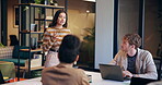 Speaker, woman and meeting with people in office for discussion, planning and ideas for headline. Manager, talking and staff listening to feedback, brainstorming and proposal for online magazine