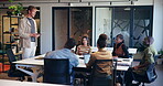 Man, tablet and meeting with people in office for discussion, planning and ideas for headline. Manager, talking and staff listening to feedback, brainstorming and review proposal for online magazine