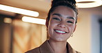 Happy, face and business woman in office with confidence for corporate finance career at night. Smile, portrait and female financial manager from Colombia with pride for job opportunity in workplace.
