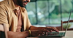 Hands, laptop and typing with remote work man in home office for online planning or research. Computer, keyboard and report with freelance employee at desk in apartment for small business startup