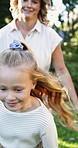 Girl, garden and mom with run for playing, relationship and relax outdoor on grass. Family, morning and mother with daughter in backyard for fun, love and bonding on weekend together for holiday