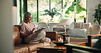 Relax, senior woman and social media with tablet for online streaming, news blog and sofa at home. House, elderly person and scroll with digital application for game, think and walking in retirement