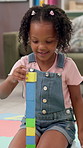 Building blocks, education and growth with girl in office for cognitive or problem solving skills. Creative, development and puzzle with child student on classroom floor for game, study or therapy