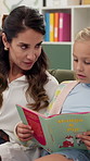Therapy, reading book and woman with girl, help and conversation with consultation. Medical service, psychology and child development with healthcare, wellness and counseling with language evaluation