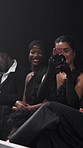 Crowd, gala and phone with woman at fashion show for runway event as clothing designer or stylist. Audience, entertainment and recording with happy person at launch or premiere of clothes brand