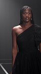 Woman, runway and model for fashion, show and evening gown with confidence, design and style expo. Girl, couture clothes and stage with garment collection for season, trend and audience at event