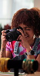 Woman, designer and camera for fashion, ecommerce and happy with product catalog at workshop. Person, entrepreneur and smile with photography for dropshipping, online shopping and jewelry at studio