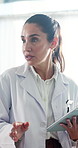 Woman, doctor and talk with tablet for consultation, medical results and feedback of diagnosis. Person, discussion and digital with information, healthcare report and explaining treatment at hospital