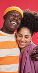 African couple, face and hug in studio for bonding together, relationship commitment and affection. Love, happy people and embrace on red background for loyalty, trust and support with connection