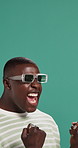 Celebration, fist pump and black man by studio background with winning, achievement or bonus. Happy, cheering and African male person with excitement for goal, target or victory with good news.