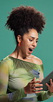 Surprise, smile and woman in studio, tablet and announcement on green background. Person, shocked and model with tech, wow and emoji with winner, victory and prize giveaway with app and online bonus