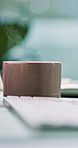 Keyboard, cup and steam in coffee on desk for morning caffeine, start day and productivity. Office, technology and hot beverage for cappuccino break, espresso aroma and energy for project inspiration