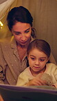 Mother, kid and reading book in tent at night for storytelling, bedtime story and learning. Woman, talking and child with novel for fairytale, language development and literature education at house