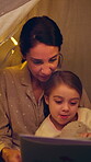Mother, child and reading book in tent at night for storytelling, bedtime story and learning. Woman, talking and kid with novel for fairytale, language development and literature education at house