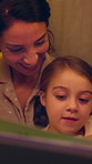 Mother, child and reading book with smile in tent for storytelling, bedtime story and learning. Woman, talking and kid with novel for fairytale, language development and literature education at house