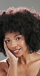 Black woman, face and smile with dermatology, cosmetic wellness or skincare results in studio. Skin glow, moisturizer and African person with beauty for treatment result isolated on gray background