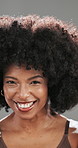 Face, beauty and afro with black woman in studio for curl pattern, natural texture and growth. Shampoo cosmetics, volume and glow with person on gray background for salon treatment and shine