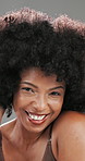 Woman, happy and face with afro in studio for touch, texture and results with keratin by background. Mature person, smile and excited with change, portrait and growth with hair care in Costa Rica