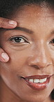 African woman, face and anti aging with eyes, smile or pride for dermatology with natural glow. Person, happy and portrait with touch, closeup or wrinkles with beauty, cosmetics or skincare in Kenya