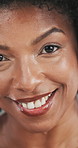 African woman, face and closeup with beauty, smile or pride for dermatology with natural glow. Mature person, portrait and touch with results, cosmetics or happy for anti aging with skincare in Kenya