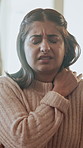 Hurt, woman and massage for shoulder pain in home, swollen and discomfort of muscle strain and sore. Bad posture, sprain and inflammation of arm in house, broken and tension of osteoporosis or injury