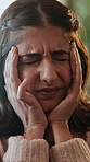 Woman, headache and frustrated with stress in home, sofa and tired with temple massage in lounge. Girl, migraine and fatigue with pain on couch, vertigo and burnout in living room at apartment